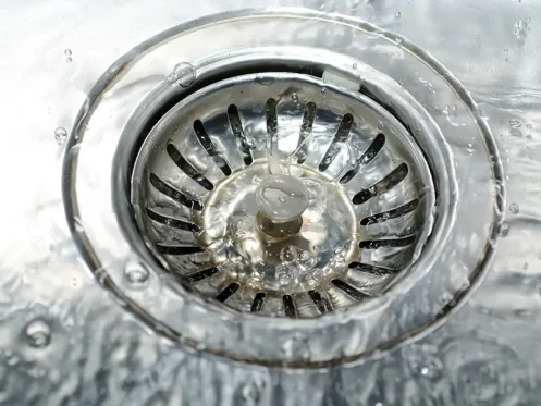 Sink drain with running water